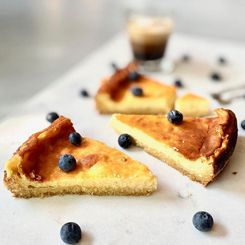 Kuchen de queso fresco y arándanos