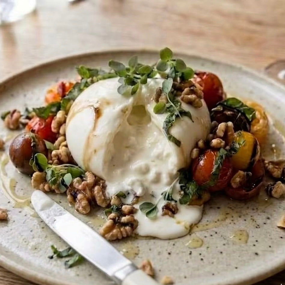 Burrata con tomates asados